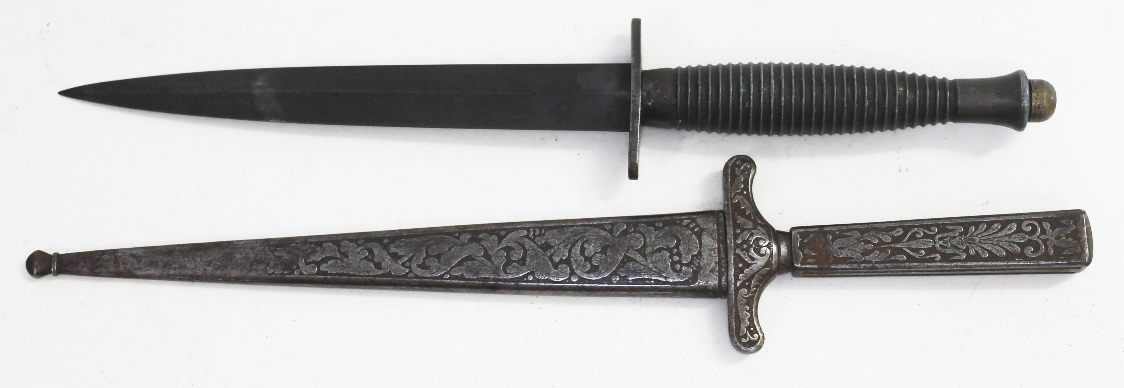 A British Fairbairn Sykes fighting knife and another.