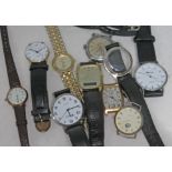 A quantity of mainly vintage wristwatches.