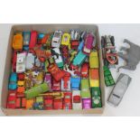 A box of mainly Matchbox die-cast vehicles, two Corgi models and an elephant...