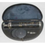 An opticians cased instrument.