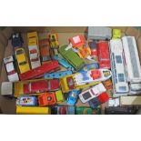 A box of Dinky die-cast model vehicles.
