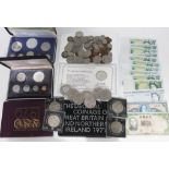 A mixed lot of coins and bank notes including proof sets, decimal sets, a commemorative silver