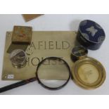 A mixed lot comprising an imitation tortoiseshell magnifying glass, length 22cm, a Lucretia