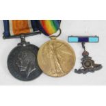 A WWI pair awarded to 74546 PTE A E SHELMERDINE MANC R and a lapel badge.