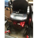 A mobility scooter - with charger, Catalogue only, live bidding available via our website.