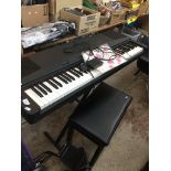 A Yamaha YPP-55 electric piano on stand and stool Catalogue only, live bidding available via our