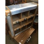 A metal bound cubby hole shelf Catalogue only, live bidding available via our website. If you
