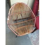 A retro cane basket chair Catalogue only, live bidding available via our website. If you require P&P