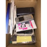 A box of mobile phones etc Catalogue only, live bidding available via our website. If you require