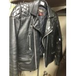 A ladies leather motorcycle jacket - size 14 Catalogue only, live bidding available via our website.