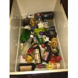 A tub of alcoholic miniatures Catalogue only, live bidding available via our website. If you require