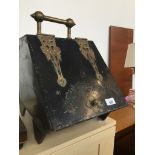 A brass bound coal scuttle Catalogue only, live bidding available via our website. If you require