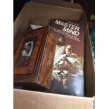 A box of misc to include deed box with key and games. Catalogue only, live bidding available via our