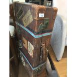 A vintage leather travel case with vintage labels - with key Catalogue only, live bidding
