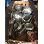 A box of pewter and metalware Catalogue only, live bidding available via our website. If you require