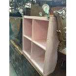 A pink open storage unit on castors Catalogue only, live bidding available via our website. If you