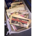 A box of sticker albums and football programmes Catalogue only, live bidding available via our