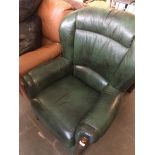 A green leather and wood show armchair Catalogue only, live bidding available via our website. If