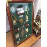 A golfing display case Catalogue only, live bidding available via our website. If you require P&P