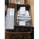 A box of boxed door handles Catalogue only, live bidding available via our website. If you require