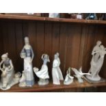 Spanish figures inc. Lladro goose and a composition figure group Catalogue only, live bidding