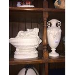 Parian ware reclining putti shell and a modern white porcelain vase Catalogue only, live bidding