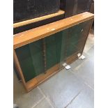 A glazed front display case Catalogue only, live bidding available via our website. If you require