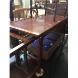 A coffee table with lower tier rack Catalogue only, live bidding available via our website. If you