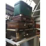 Four vintage travel cases Catalogue only, live bidding available via our website. If you require P&P