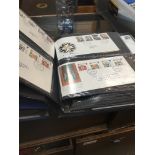 A large folder of first day covers Catalogue only, live bidding available via our website. If you