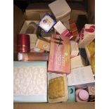 A box of cosmetics. Catalogue only, live bidding available via our website. If you require P&P