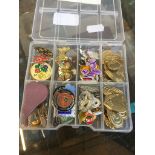 Approx 40 pin badges Catalogue only, live bidding available via our website. If you require P&P