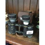 Pair of military binoculars and a box camera Catalogue only, live bidding available via our website.