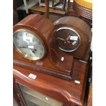 An inlaid steel dial mantle clock and an oak cased mantle clock Catalogue only, live bidding