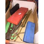 A box of old tools, instruments, calipers, etc. Catalogue only, live bidding available via our