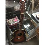 A Tanglewood semi acoustic guitar Catalogue only, live bidding available via our website. If you