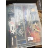 A plastic box with model kit making accessories/parts Catalogue only, live bidding available via our