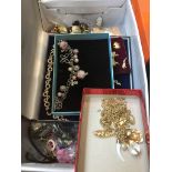 A box of costume jewellery etc Catalogue only, live bidding available via our website. If you