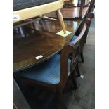 A reproduction mahogany extending dining table with 6 chairs Catalogue only, live bidding
