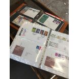 Two albums of first day covers Catalogue only, live bidding available via our website. If you