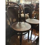 A pair of vintage bentwood cafe style chairs Catalogue only, live bidding available via our website.