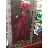 A boxed doll. Catalogue only, live bidding available via our website. If you require P&P please read