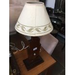 An Art deco wooden table lamp Catalogue only, live bidding available via our website. If you require