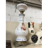 A large Victorian milk glass oil lamp. Catalogue only, live bidding available via our website. If