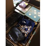 A box of handbags, smokers hat and other vintage wares Catalogue only, live bidding available via