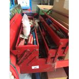 A red metal toolbox and tools Catalogue only, live bidding available via our website. If you require