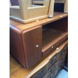 A retro teak av stand on castors Catalogue only, live bidding available via our website. If you
