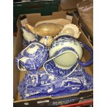 A box with blue and white pottery and large shells Catalogue only, live bidding available via our