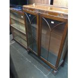 Two glazed display cabinets Catalogue only, live bidding available via our website. If you require