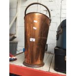 A copper coal scuttle Catalogue only, live bidding available via our website. If you require P&P